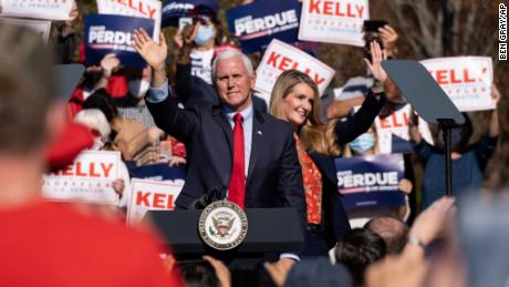 Vice President Mike Pence and Georgia Sen during a majority rally in Canton, Georgia on November 20, 2020.  Kelly Lofler wave to the crowd.