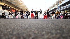 F1 drivers stand up and take a knee