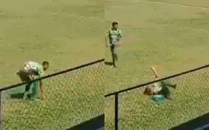 The soccer player pretended to receive a stone to deceive the referee