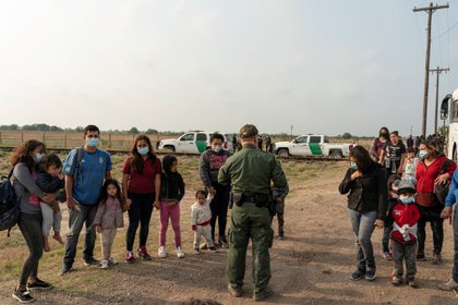 Asylum seekers waiting to cross the Rio Grande to Texas (Reuters)