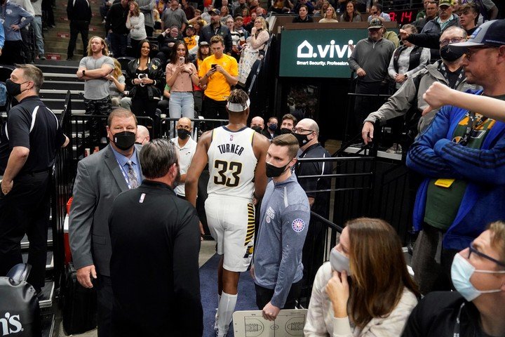 Miles Turner heads to the locker room after being fired.  (AP Photo/Rick Bowmer)