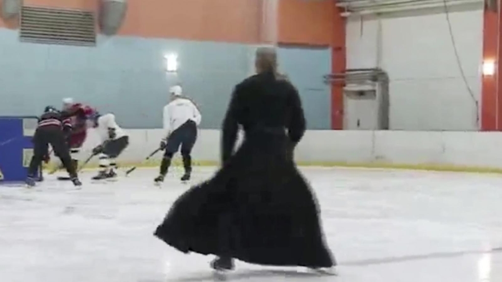 Watch a priest perform a mass on an ice hockey rink