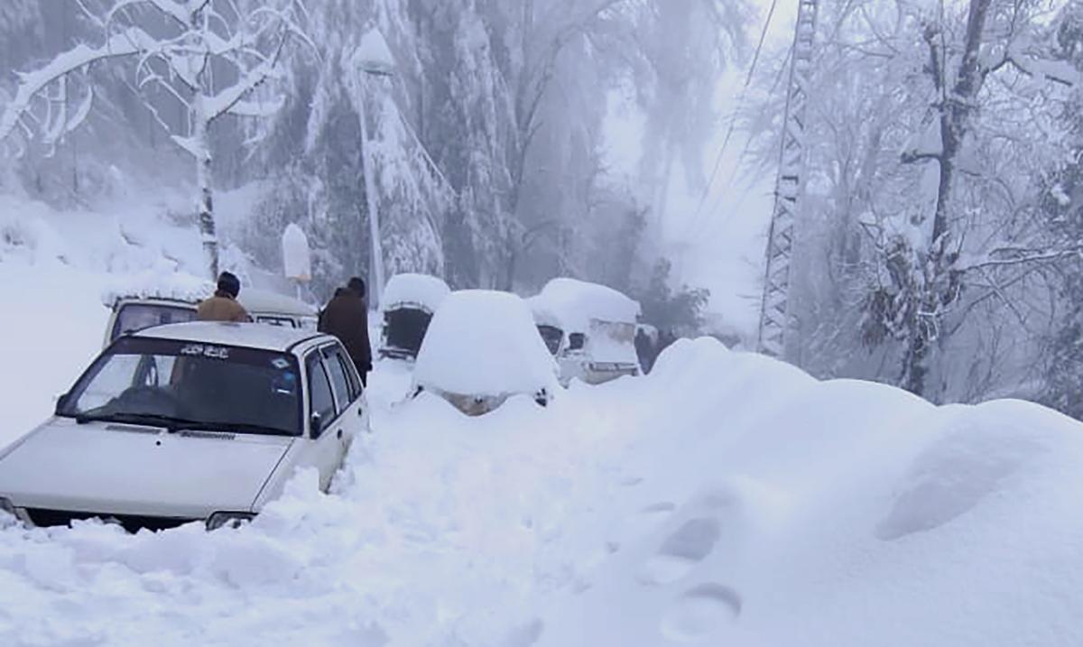 The number of tourists who died in their cars during heavy snowfall in Pakistan has risen to 22