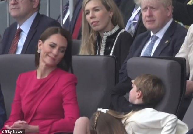 In one moment, the Duchess of Cambridge sent a quick kiss to Louis as he looked at her during a long day outside celebrating his great-grandmother on Sunday