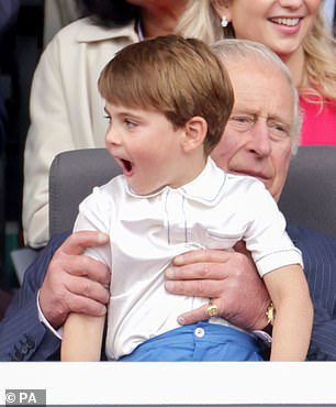 He later moved to his other relatives and sat in the lap of his grandfather, Prince Charles
