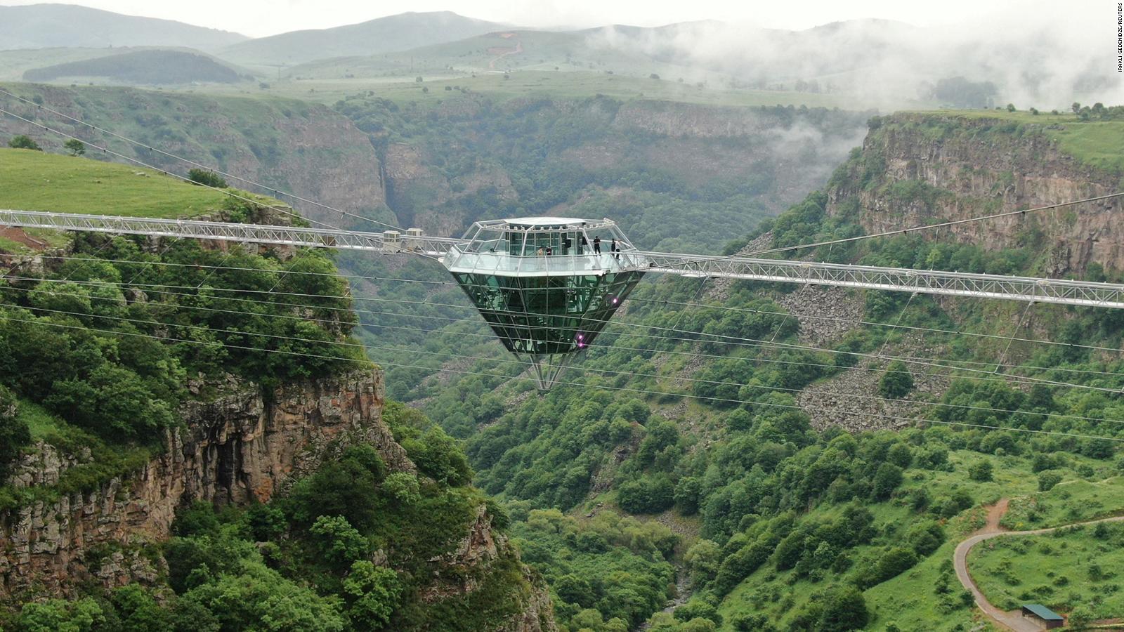 This glass bar hangs over a valley in Georgia