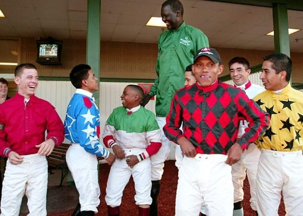 When Manute Bol Became The Tallest Horse Jockey Ever