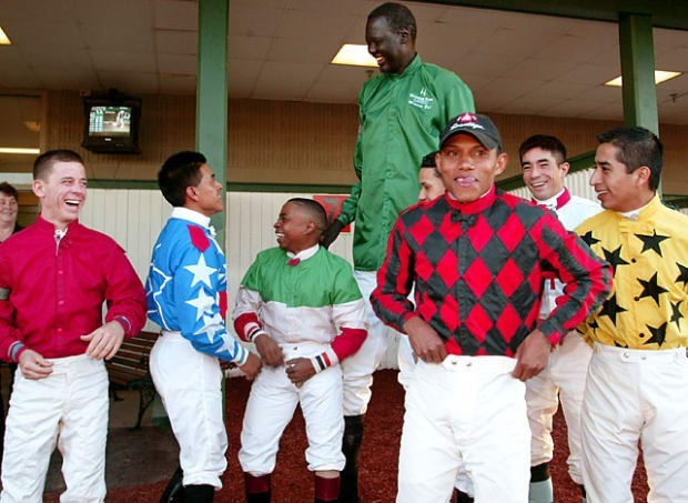 When Manute Bol Became The Tallest Horse Jockey Ever