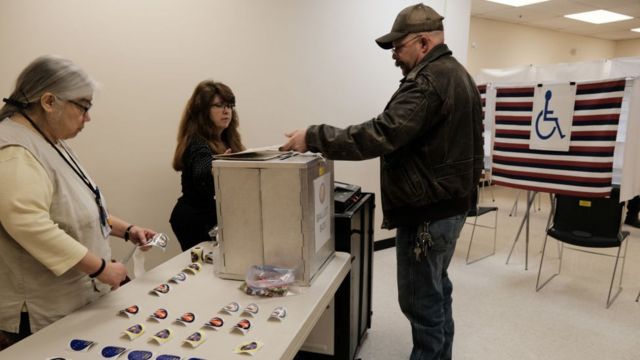 A man participates in the midterm elections in the United States.