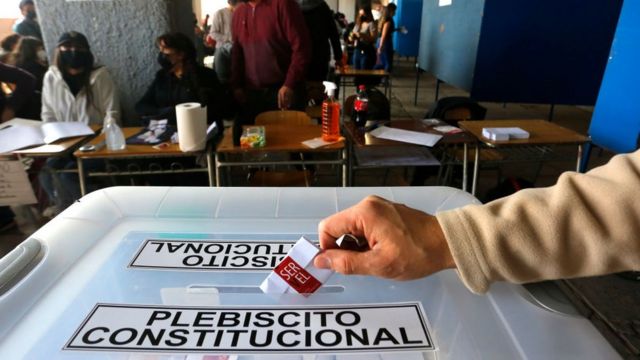 A person votes during the constitutional referendum in Chile.